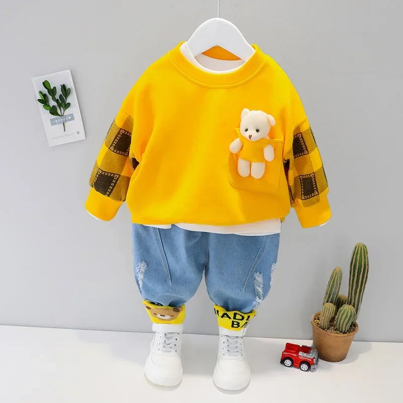 Baby outfit set with teddy bear pocket shirt and denim pants, available in two colors for playful everyday wear.