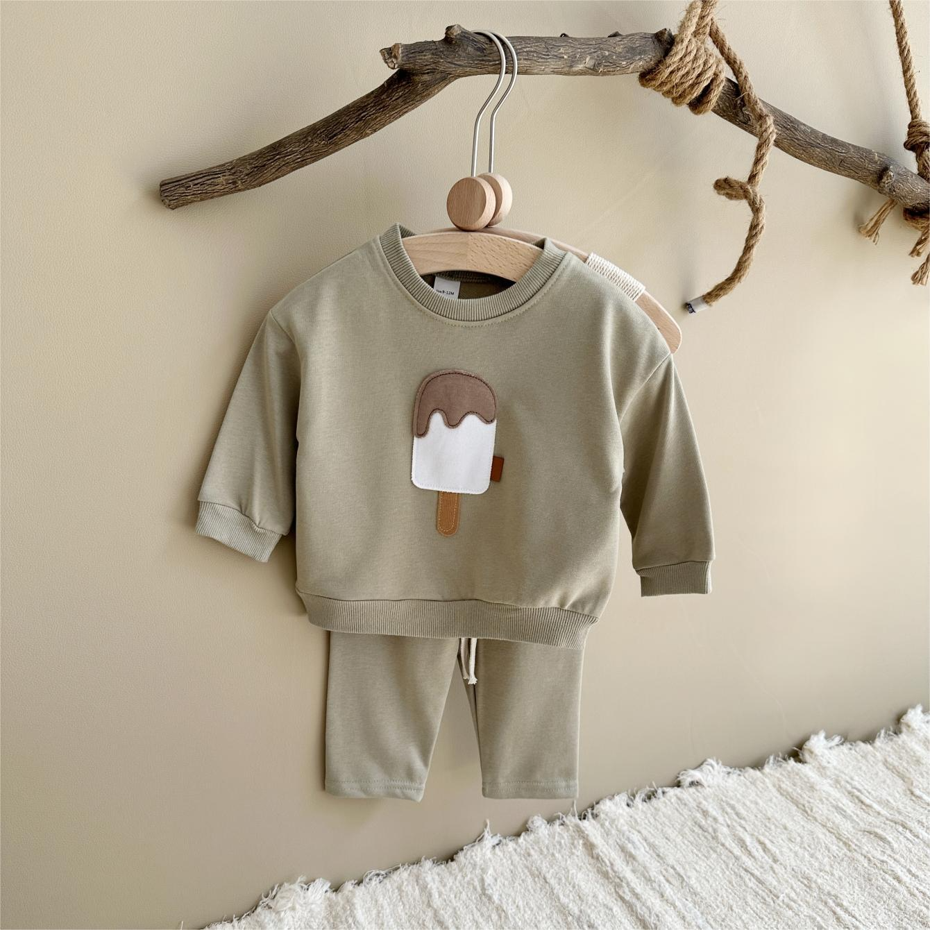 Baby outfit set with a shirt featuring a cute ice cream design and comfy pants, available in various colors for playful and comfortable everyday wear.