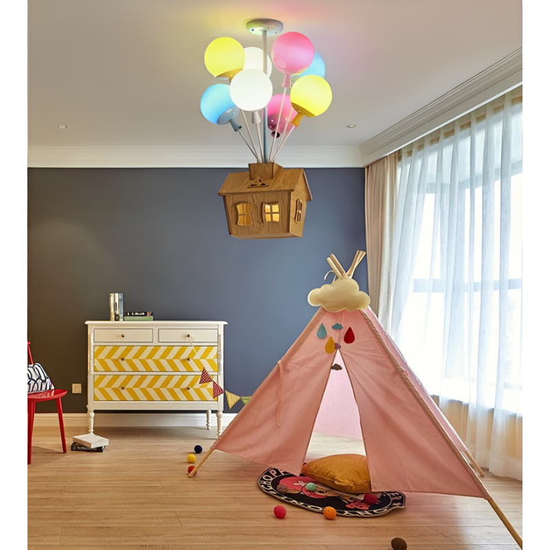 Floating House Lamp - Enchanting Ceiling Light for Kids' Rooms. Features a Charming Wooden House Suspended by Colorful Balloons for a Whimsical Effect. LED Light Source with Energy Efficiency and Long Lifespan. Ideal for Creating a Magical and Cozy Atmosphere. Nordic Modern Design with High-Quality Iron, Wood, and Acrylic Materials. Perfect for Children's Bedrooms and Playrooms.