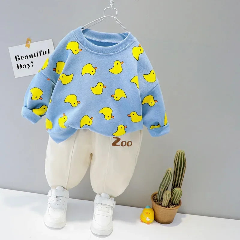 Baby outfit with duckling-adorned shirt and comfy pants, perfect for playful everyday adventures