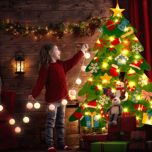 Toddler playing with a safe, interactive felt Christmas tree
