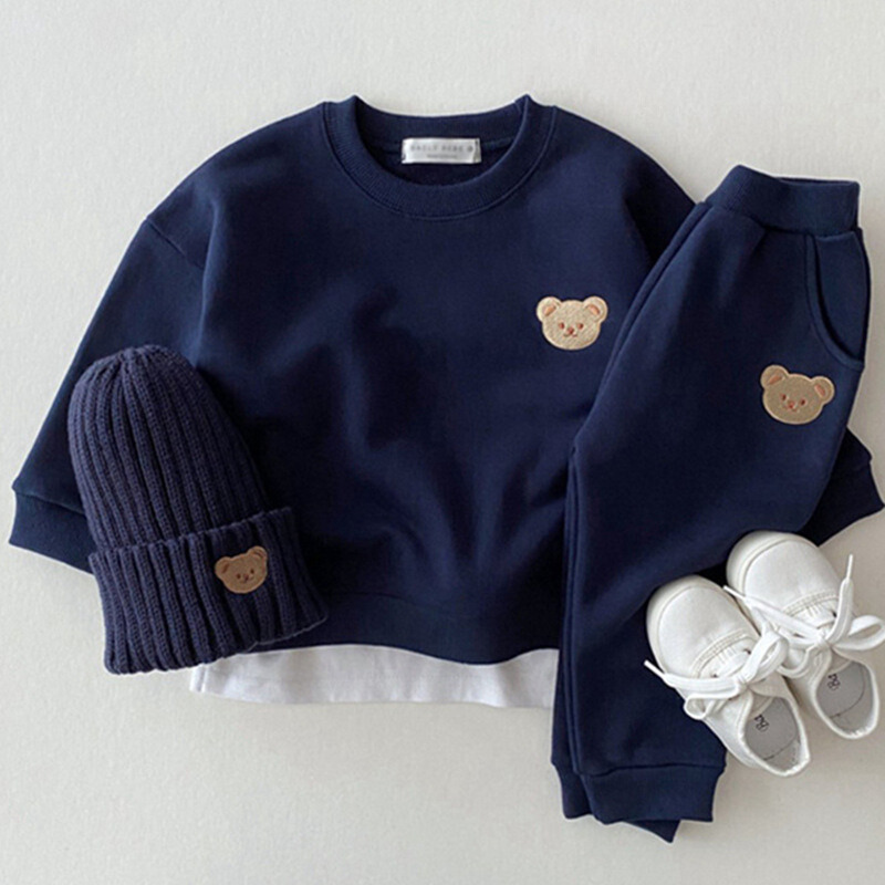 Cozy Comfort Romper featuring a soft cotton top and coordinating cotton pants. Available in various colors, this outfit ensures maximum comfort for daily wear and playful adventures.